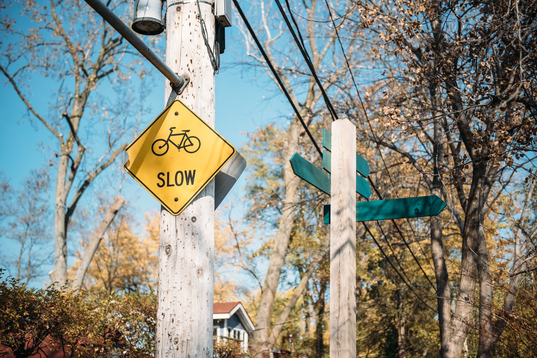 slow down street sign