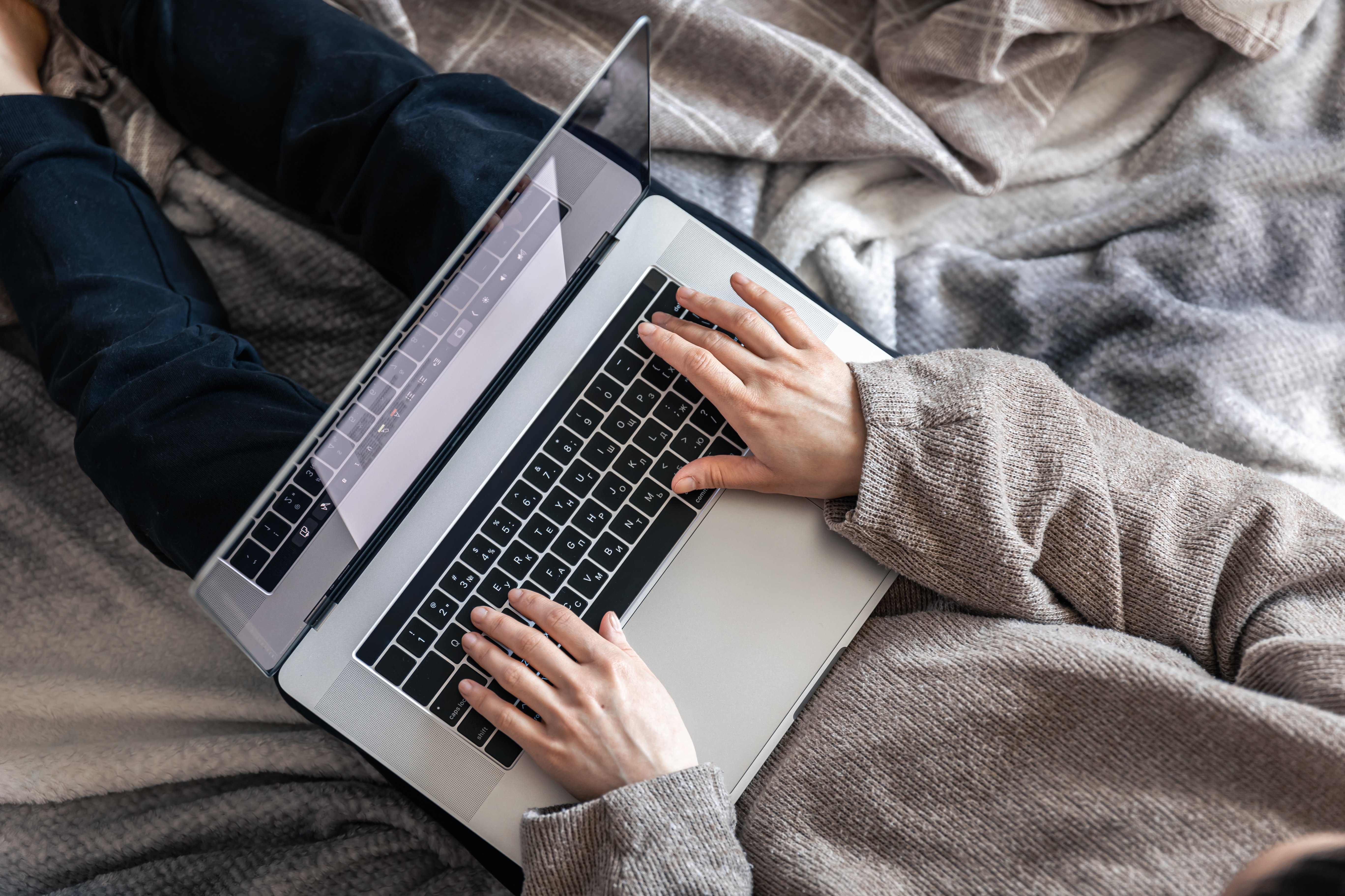 woman-working-sitting-laptop-top-view (1)