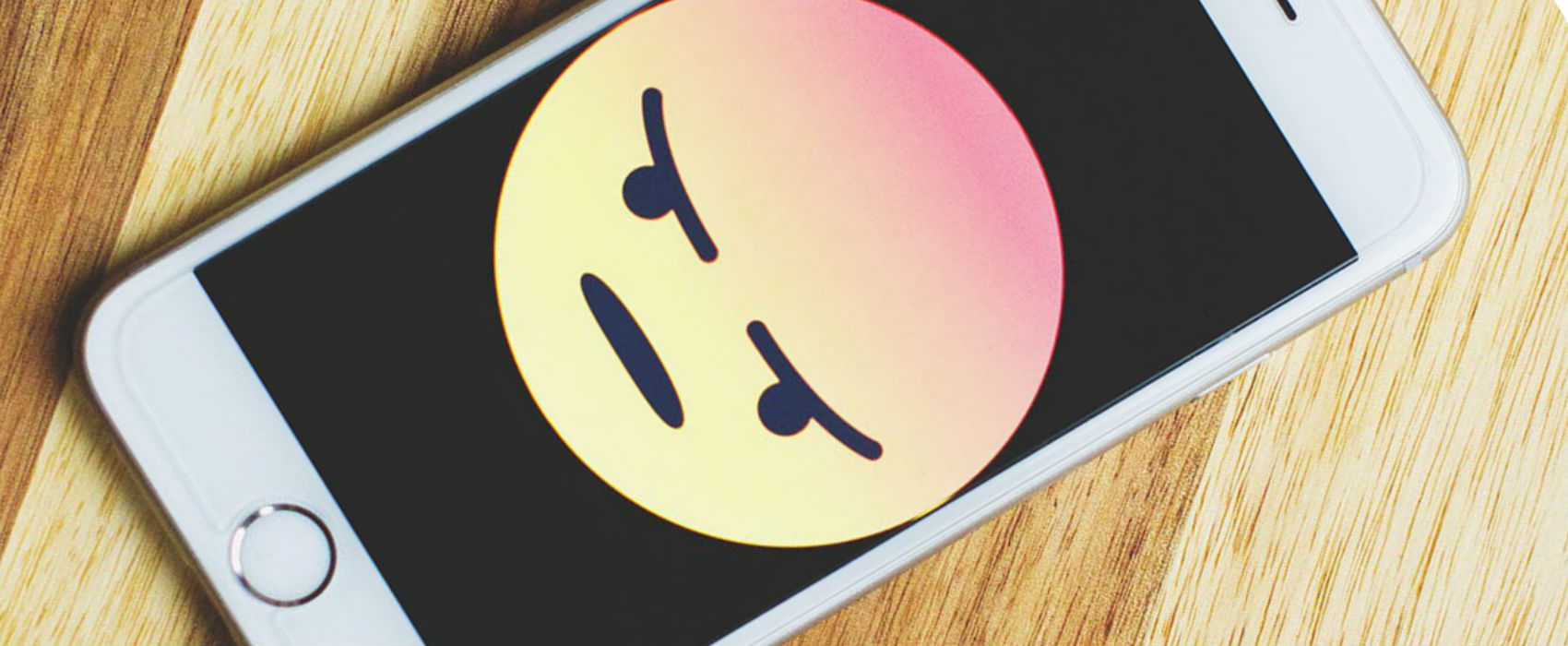 angry emoji on smartphone